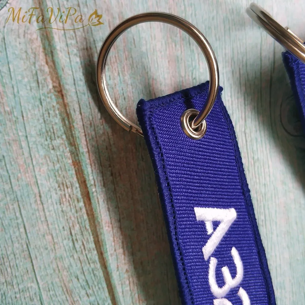 2 PCS A ROYAL BRUNEI SIDE B A320 EMBROIDERY KEY CHAIN